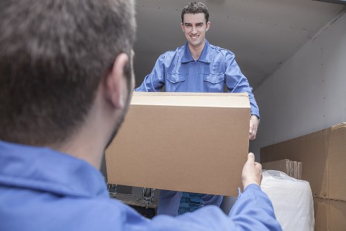 Furniture removals team handling household items in Bermondsey