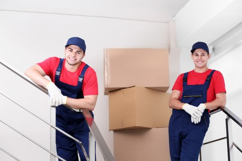 Specialist movers using equipment for secure piano removals Bermondsey