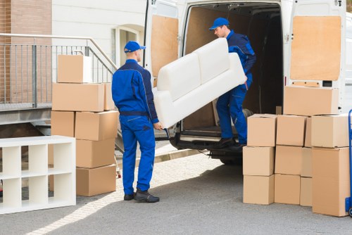 Household furniture being loaded into a removal truck in Bermondsey